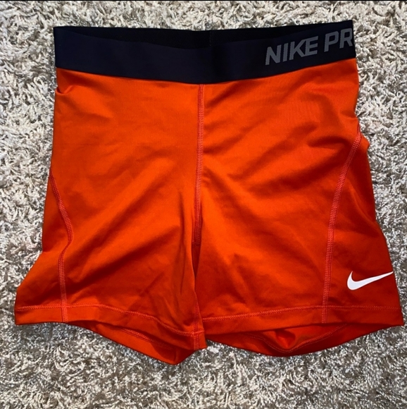 orange nike spandex shorts
